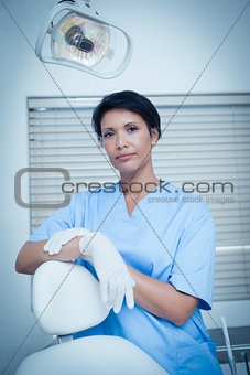 Serious young female dentist