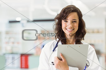 Pretty medical student smiling at camera