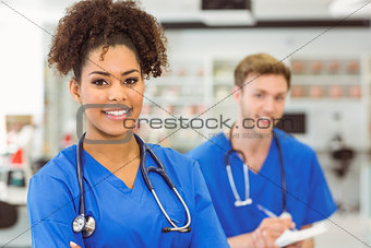 Young medical student smiling at the camera