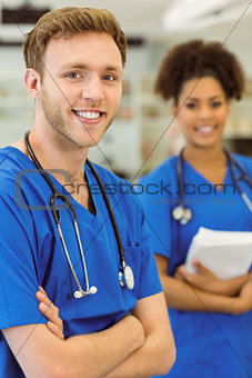 Young medical students smiling at the camera