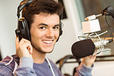 Portrait of an university student recording audio