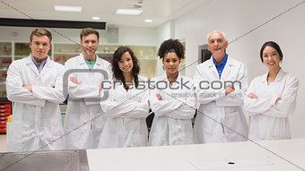 Medical student and lecturer smiling at camera