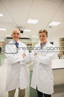 Science student and lecturer smiling at camera