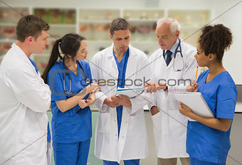 Medical professor talking with students