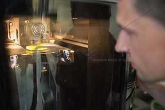 Engineering student using 3d printer