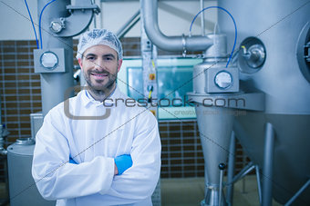 Food technician smiling at camera