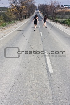 Young women in the road