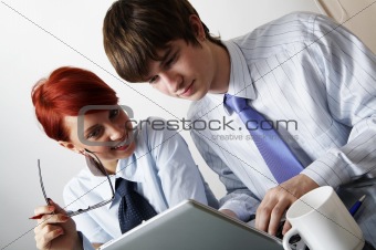 beautiful caucasian business woman with young consultant