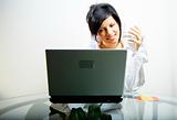 beautiful woman with laptop in mens shirt