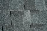 Black asphalt roofing shingles background