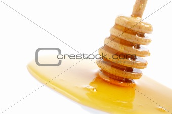 Honey and wooden drizzler