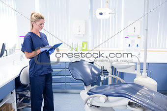 Dentist working on tablet pc
