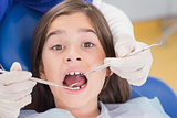 Portrait of a scared young patient in dental examination