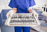 Dentist holding tray with equipment