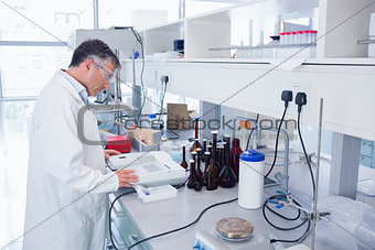 Scientist carrying out an experiment