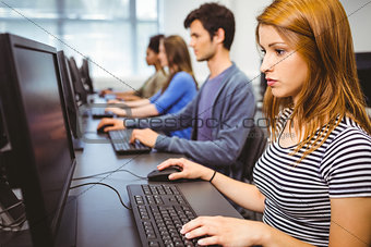Focused student in computer class