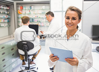 Junior pharmacist using tablet pc