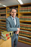 Lawyer standing in the law library