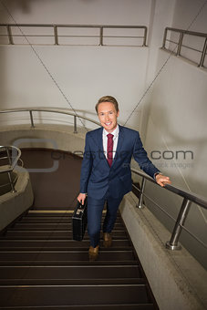 Businessman going up the stairs