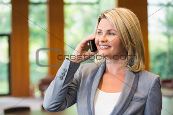Blonde businesswoman on the phone