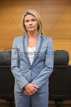 Stern lawyer looking at camera