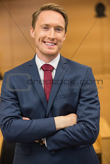 Smiling lawyer looking at camera