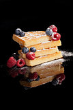 Luxurious waffle with different berries isolated.