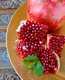 natural organic juicy ripe pomegranate on the table