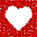 Big white paper heart with small red hearts