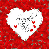 Big white paper heart on a background made of small red hearts