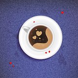 Cup of coffee on a jeans background