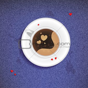 Cup of coffee on a jeans background