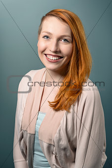 Smiling red haired  Woman Looking at Camera
