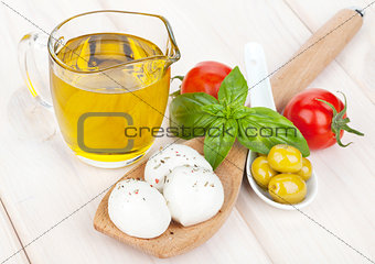 Mozzarella, olives, tomatoes and basil