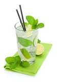 Fresh mojito cocktail and limes with mint