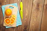 Sliced orange on cutting board