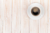 Coffee cup on white wooden table