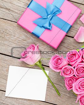 Pink roses and valentines day greeting card or photo frame and g
