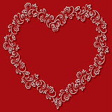 Vector floral frame in the shape of hearts on a red background