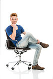 Young man sitting on a chair