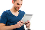Young man working with a tablet