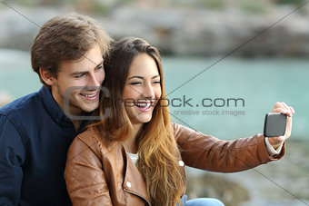 Couple watching videos in a smart phone