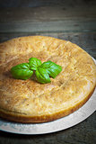 Freshly baked traditional Russian homemade pie with potatoes and