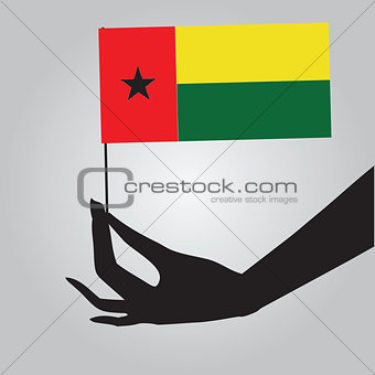 Hand with flag Guinea-Bissau