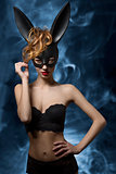 funny girl with sexy bunny mask 