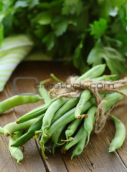 organic green peas on a wooden table, rustic style