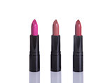 Three lipsticks in glamorous colors 