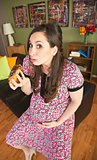 Hungry Pregnant Woman with Eclair