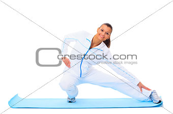 fitness woman making a break in tailor-seat on white background
