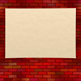 Paper sheet on brick wall